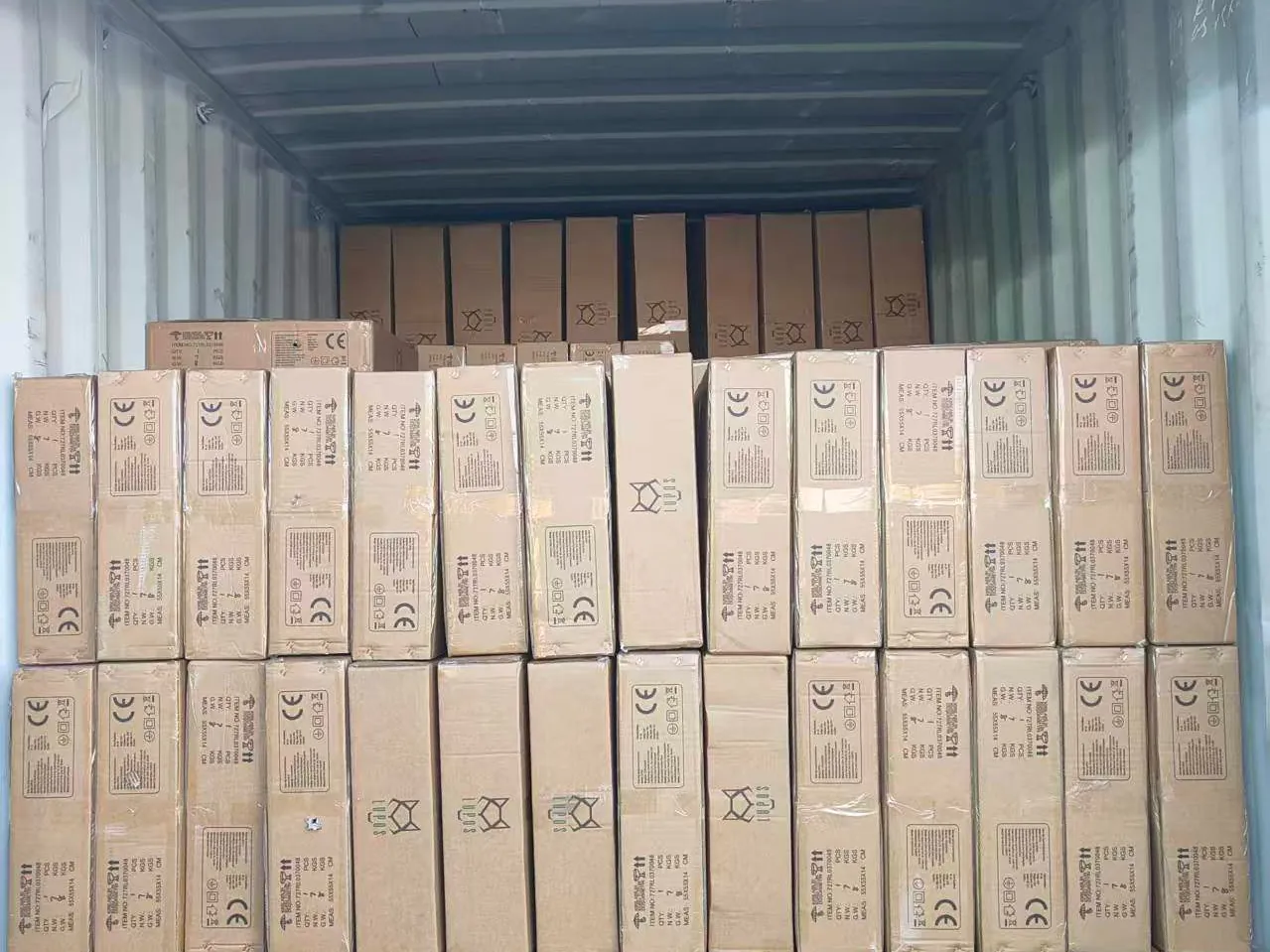 Cartons of Lupos-branded products being loaded into a container in China