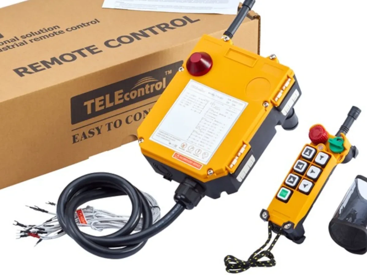 F24-6D industrial remote control set with handheld transmitter, receiver unit, connection cables, and protective box used in industrial machinery applications
